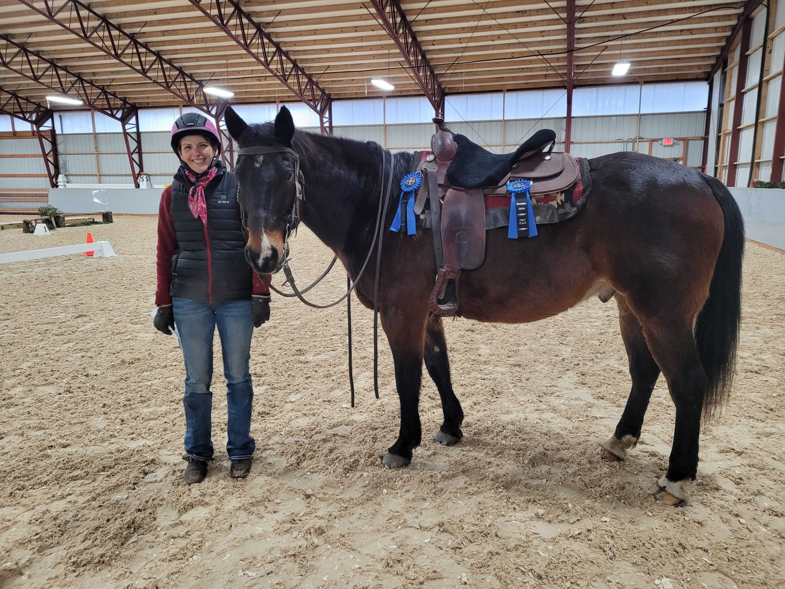 laura standing with a horse