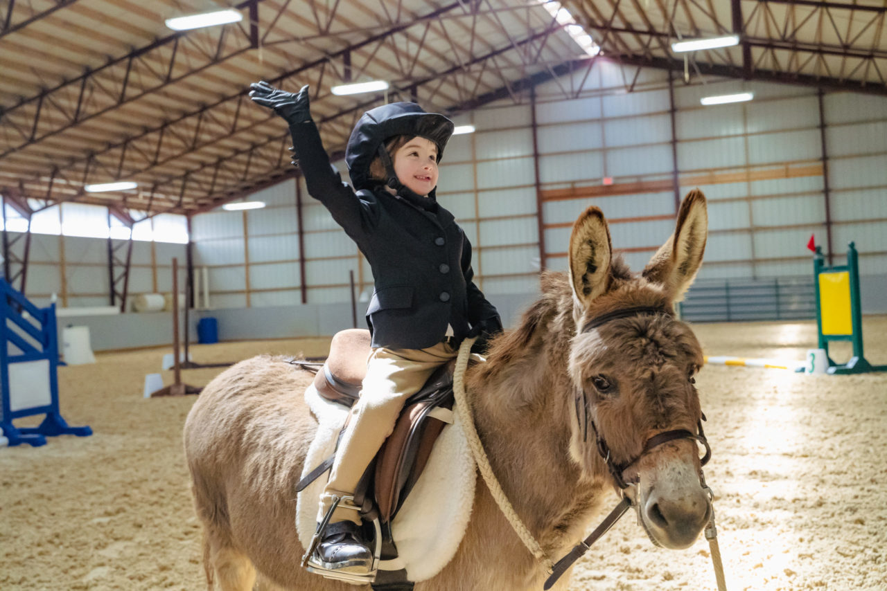 a boy on a horse